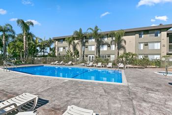 Sparkling pool area with spa